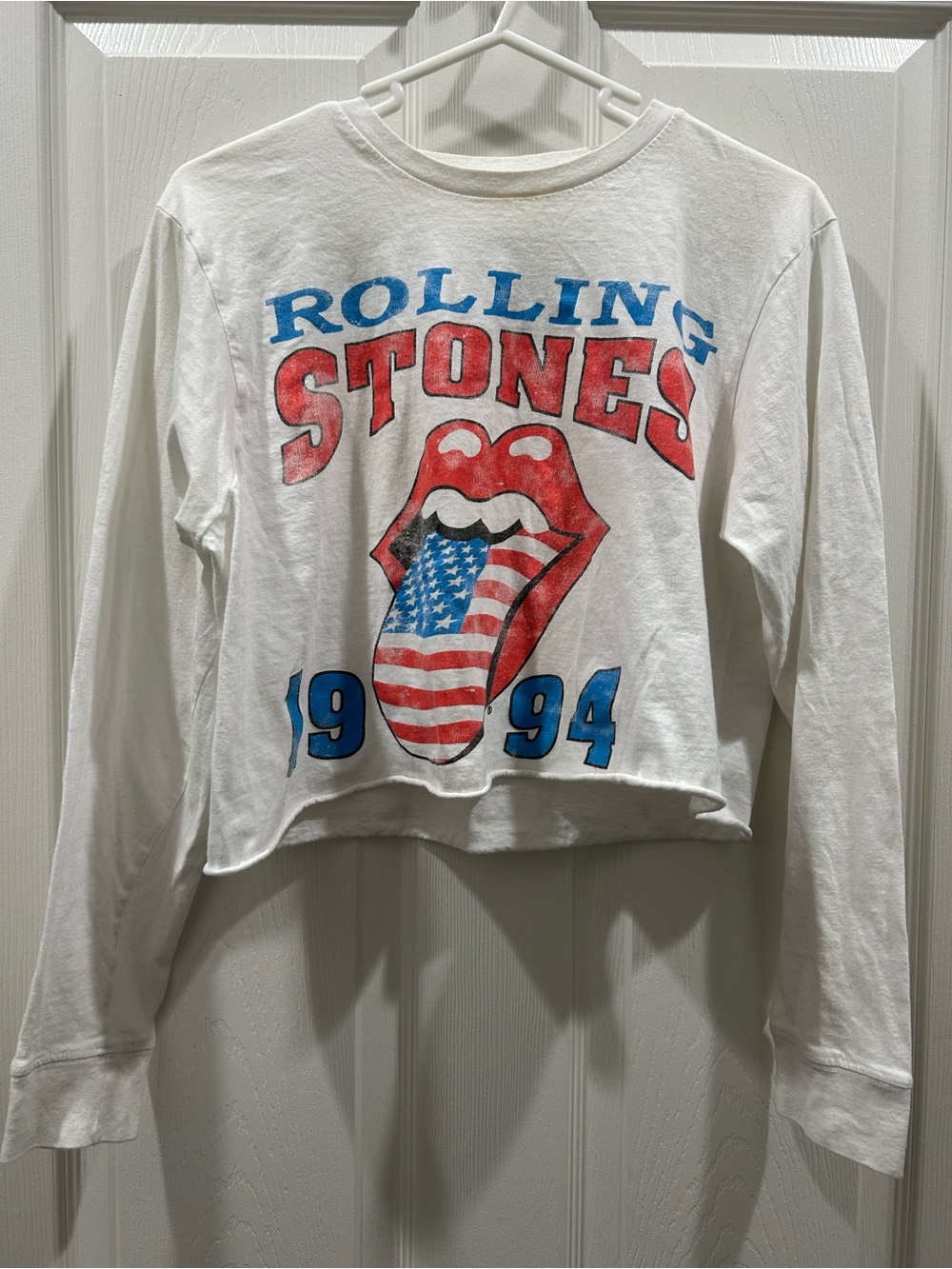 the Rolling Stones White Long-Sleeve Crop Tee with Red & Blue Graphic